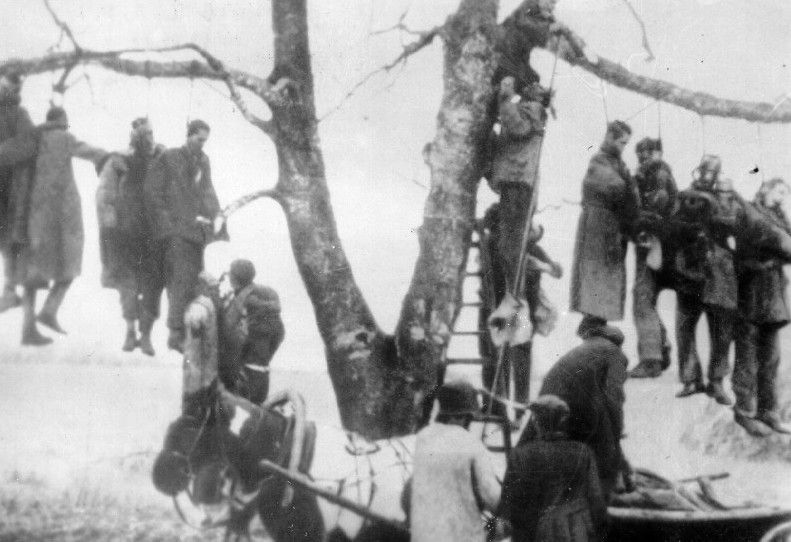 Soviet POWs hanged on a tree in Kharkov by German soldiers